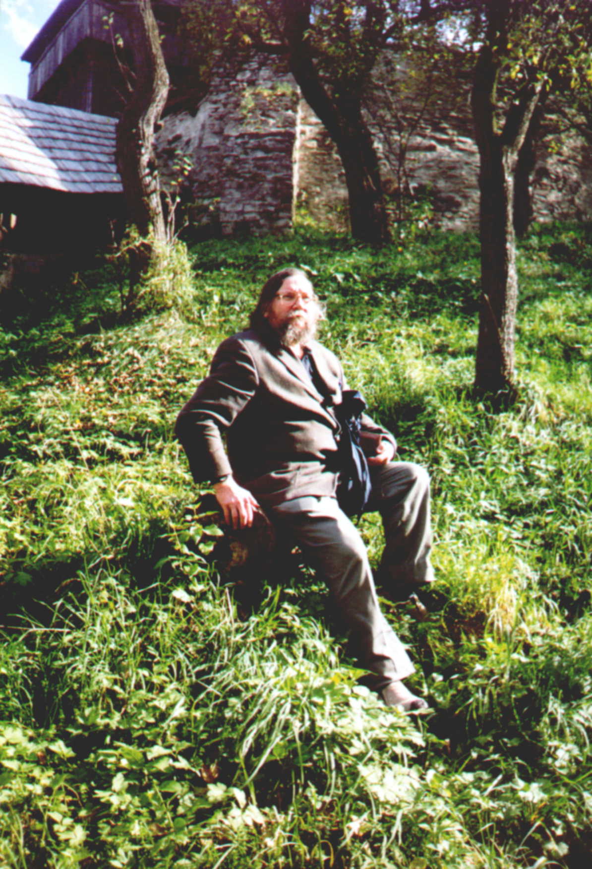 Old man in front of church
